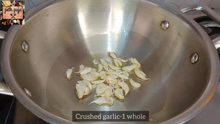 Step 2.1: Heat oil in a pan and add crushed garlic pods