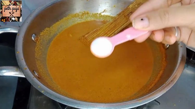 Step 2.1: Pour hot water into the pan , salt to taste, mix well, and cook for another 5-7 minutes