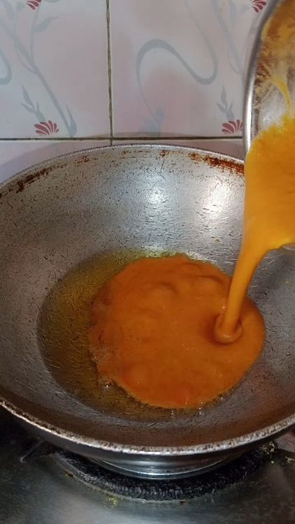 Step 2.1: Heat oil in a pan and add the tomato-cashew puree