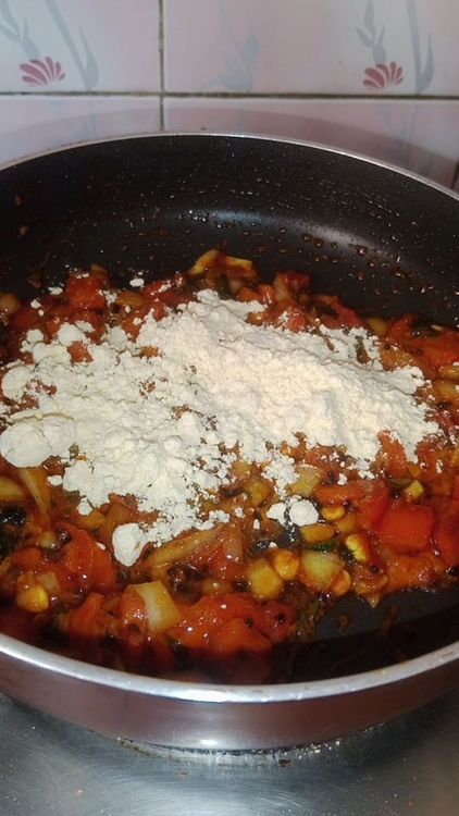 Step 1.1: Add roasted besan, cover the pan, and simmer for 2 minutes