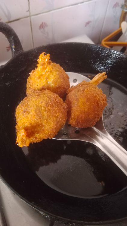 Step 2.1: Deep fry the lollipops on medium to low flame until they are crisp and golden brown