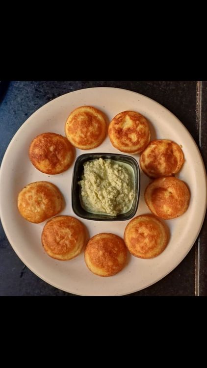 Step 2.1: Serve hot with coconut chutney, tomato chutney, or podi mixed with ghee