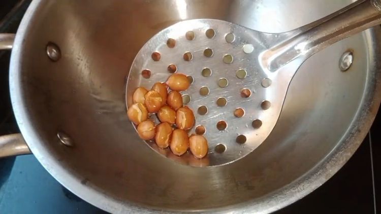 Step 1.1: Heat oil in a pan and fry the peanuts until crisp