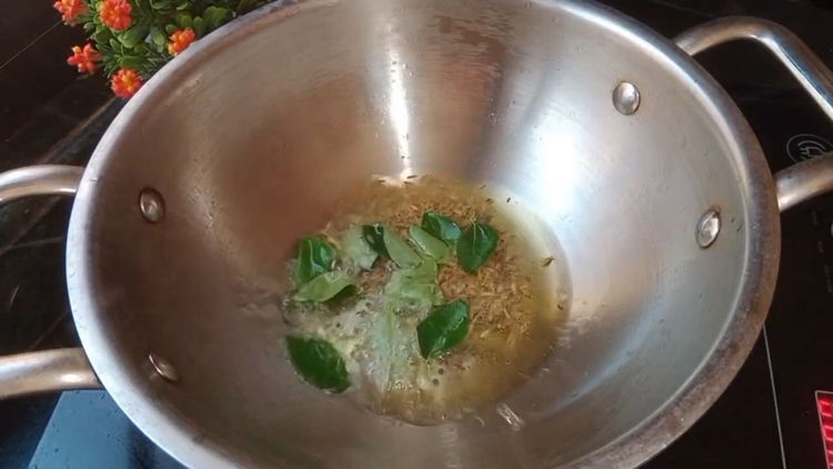 Step 1.1: In the same oil, add mustard seeds, cumin seeds, curry leaves, and chopped green chillies