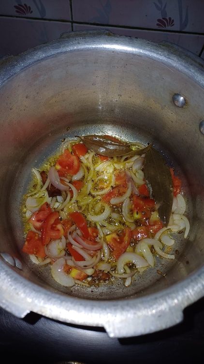 Step 2.1: Add sliced onion and sauté until translucent