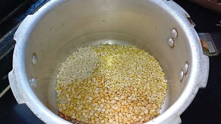 Step 1.1: In a pressure cooker, add long grain basmati rice, toor dal, moong dal, and urad dal