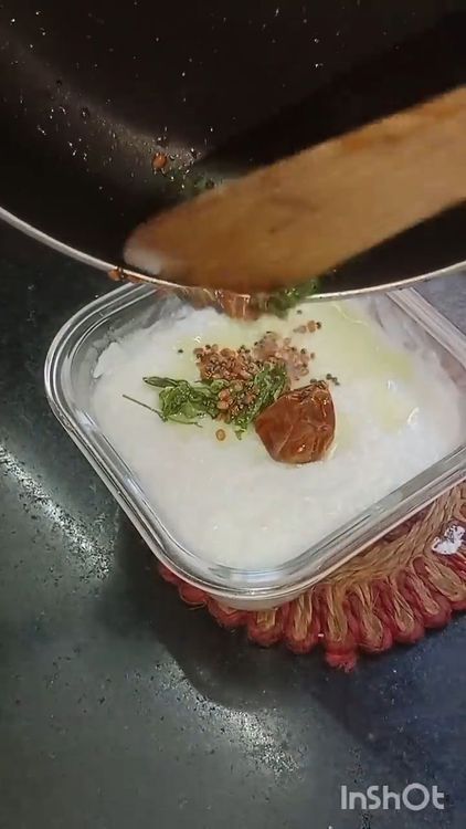 Step 3.1: Pour the prepared tempering over the curd rice mixture and mix well