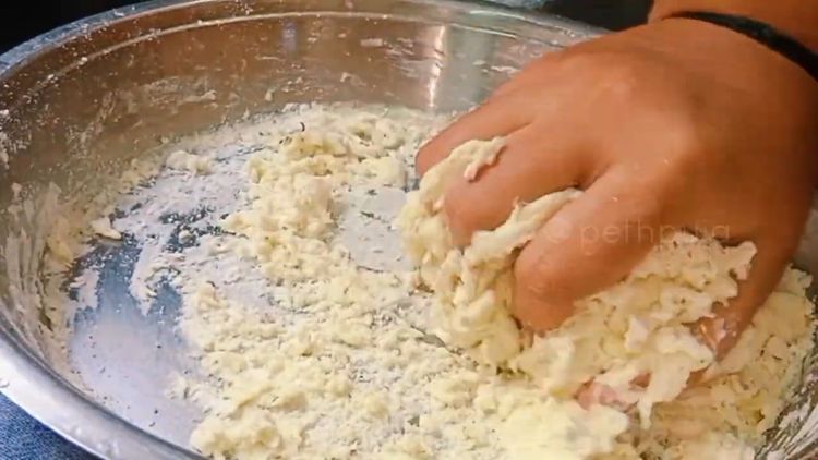 Step 2.1: In a wide pan, knead the all-purpose flour, oil, salt, oregano, and baking soda into a tight dough
