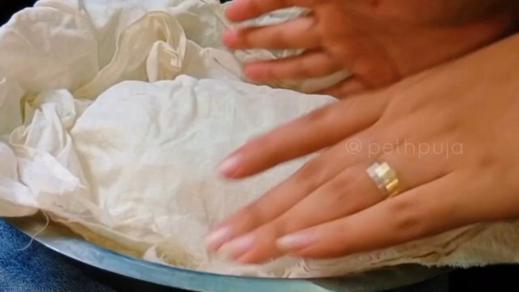 Step 2.2: Grease the dough with butter or oil, cover with a damp wet cloth, and let it rest for 10-15 minutes to activate the gluten