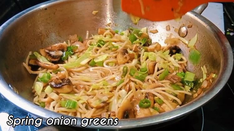 Step 3.2: Add mushroom slices, salt to taste, shredded cabbage, and boiled noodles
