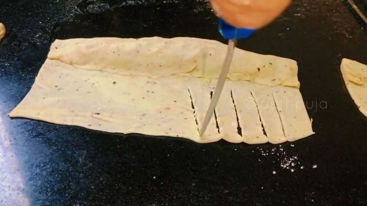 Step 4.2: Place stuffing at one end and start rolling like a spring roll