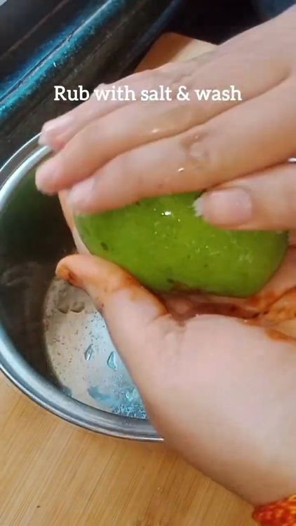 Step 1.2: Clean the skin of the raw mangoes with salt to remove chemical impurities, if present