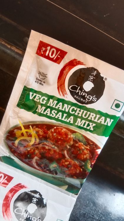 Step 2.1: Mix Ching's Manchurian masala mix with the reserved squeezed water and additional water