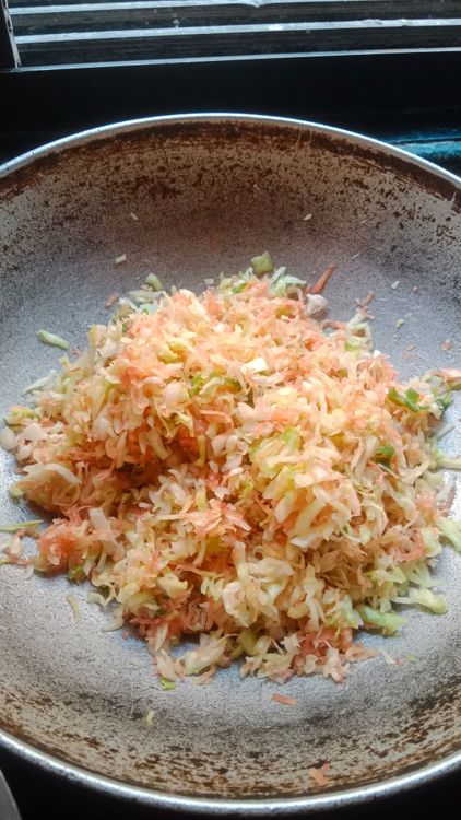 Step 1.3: Squeeze the rested vegetables to remove excess water and transfer them to a large bowl