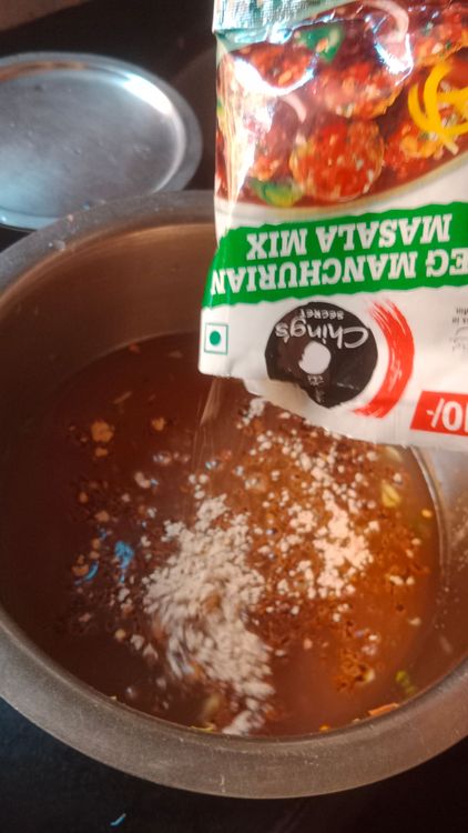 Step 2.2: Mix Ching's Manchurian masala mix with the reserved squeezed water and additional water