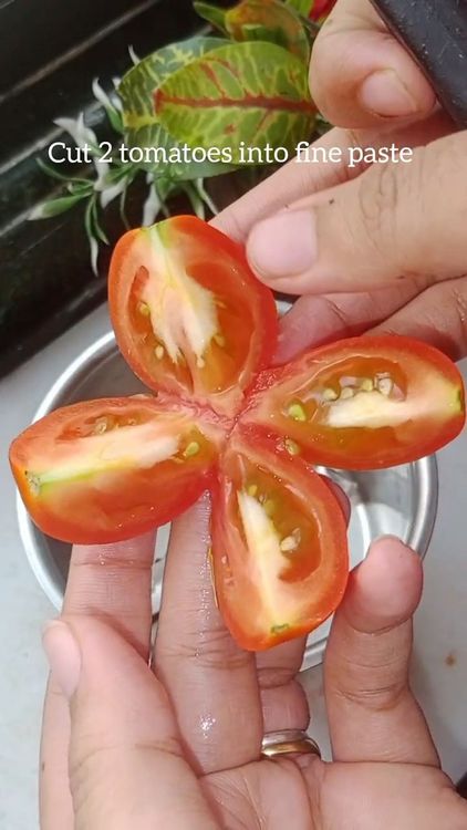Step 1.1: Make a puree of two tomatoes and roughly crush one tomato using a mortar and pestle