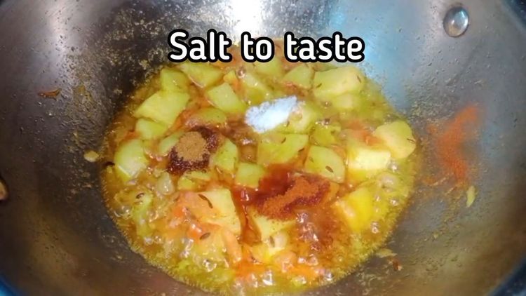 Step 2.1: Add 2 tsp red chilli powder, 1 tsp coriander powder, and salt to taste