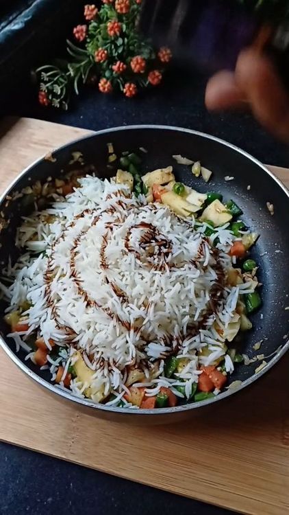 Step 1.1: Mix in cooked long grain rice and dark soya sauce
