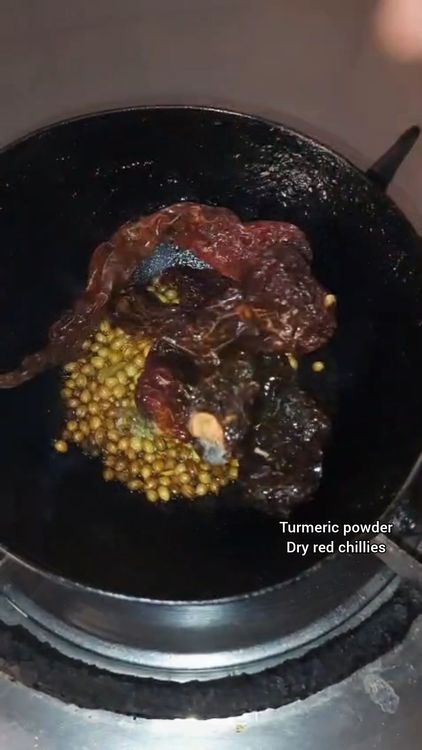 Step 2.1: Add turmeric powder and dry red chillies