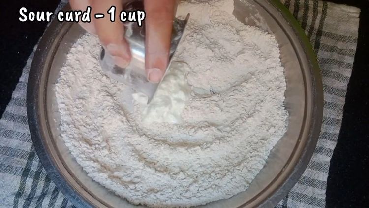 Step 1.2: In a big bowl, mix whole wheat flour, salt, baking powder, sugar, and sour curd