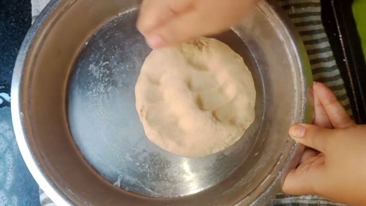 Step 1.1: After resting, knead the dough again for 2-3 minutes and make medium-sized balls slightly bigger than usual chapati size