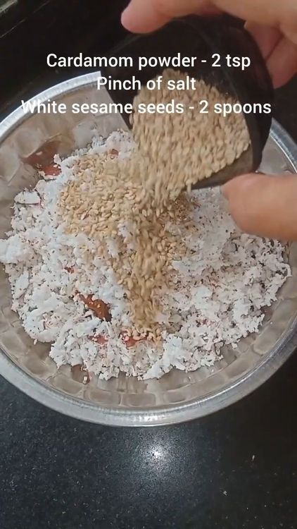 Step 2.2: Mix coconut, grated jaggery, cardamom, sesame seeds, and a pinch of salt