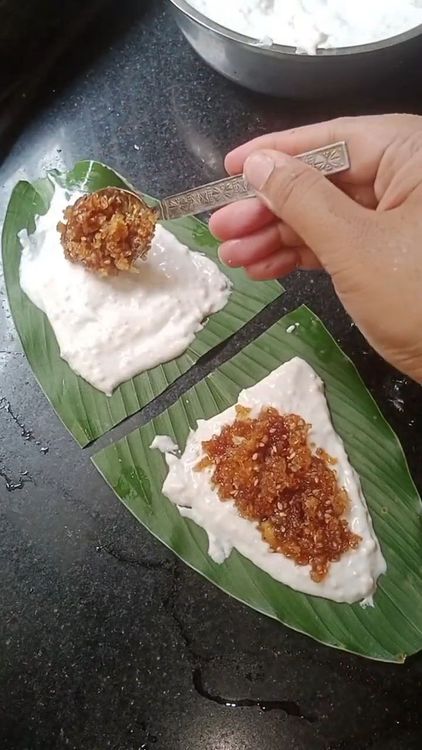 Step 3.1: Apply a layer of rice batter in the middle of the leaf, avoiding the edges