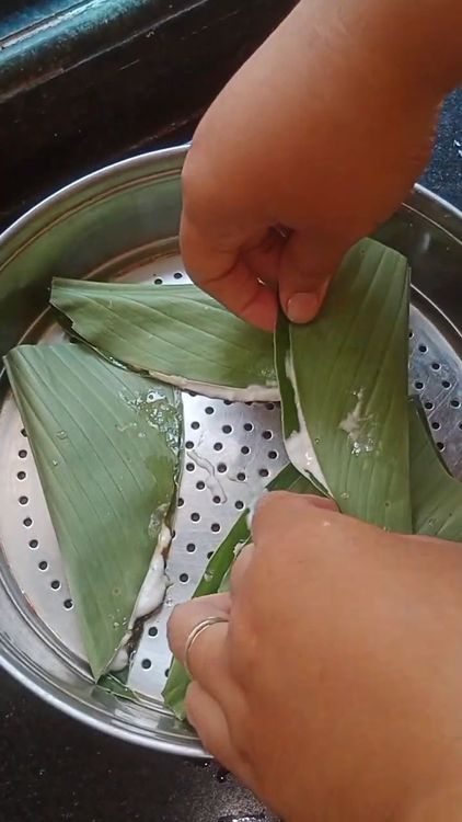 Step 3.1: Fold the leaf neatly to cover the filling without overfilling