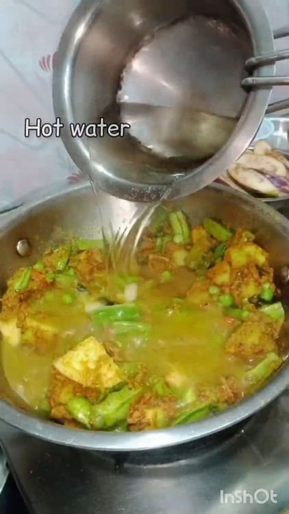 Step 4.1: Add hot water and cook until the vegetables are 70 percent done