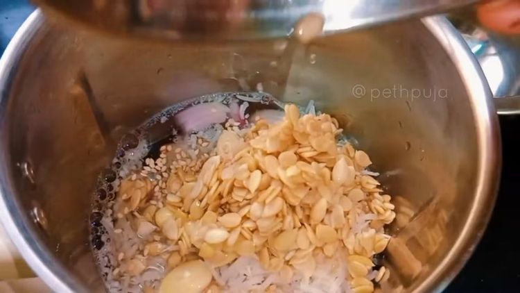 Step 1.1: Grind them into a fine paste by adding garlic pods