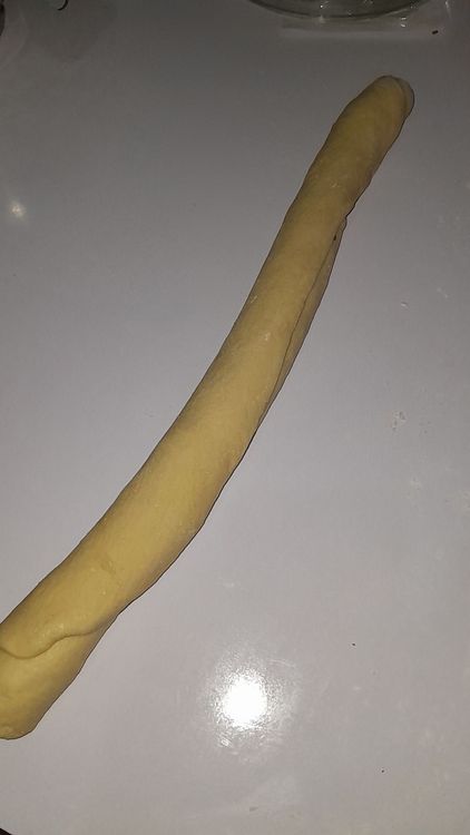 Step 5.1: Cut the rolled coated dough into 1-inch pieces and arrange in a greased loaf pan