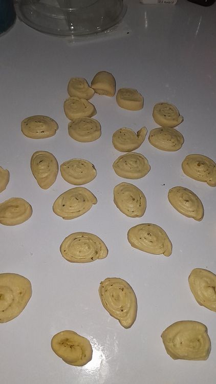 Step 5.3: Cut the rolled coated dough into 1-inch pieces and arrange in a greased loaf pan