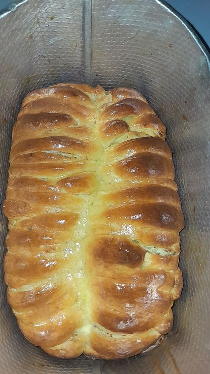Step 7.1: Remove the garlic bread from the oven and let it cool in the pan for 5 minutes