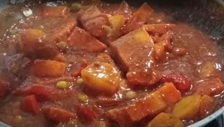 Step 3.1: Cover and let the dish simmer on low heat until the pork is tender and the sauce has thickened
