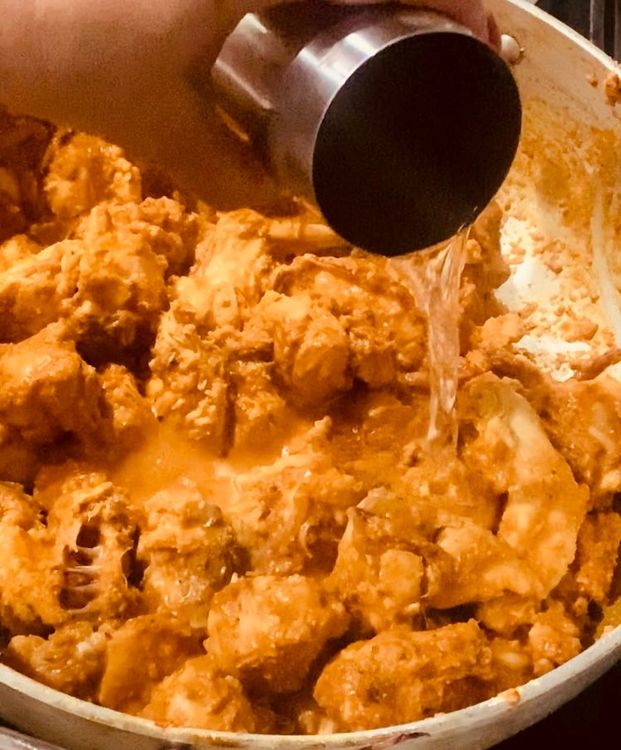 Step 2.1: Pour in the water, stir and bring to a boil