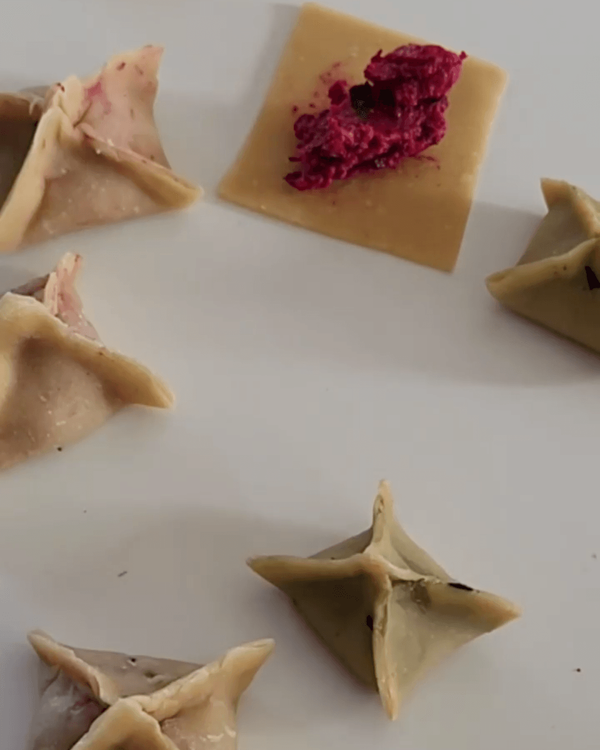 Step 3.1: Fold the pasta over the filling to form parcels