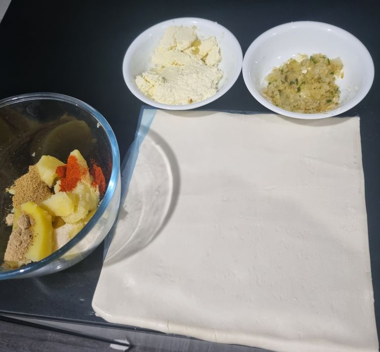 Step 1.1: Place boiled potatoes, home made paneer, salt, chilli and coriander powder and leaves, mango powder and green chilli in a medium bowl