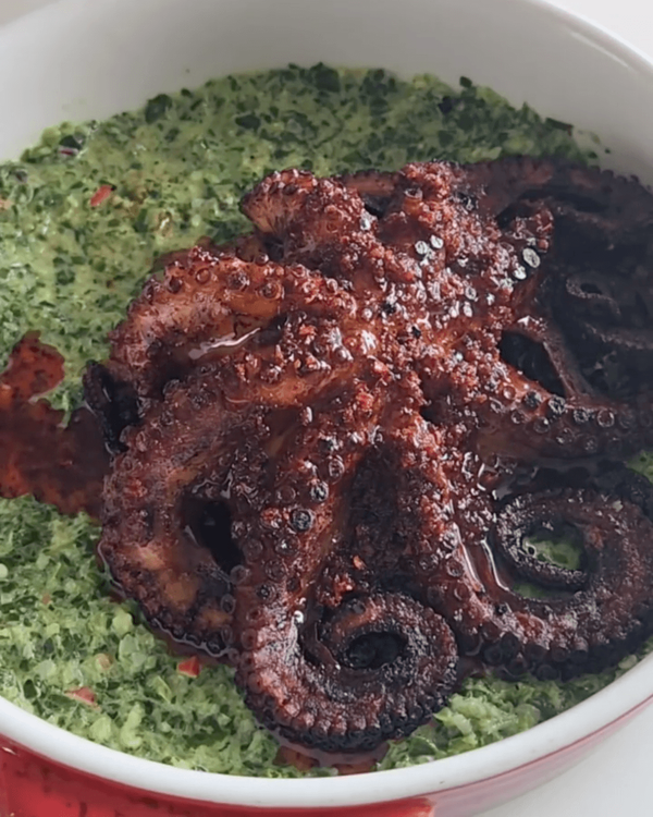 Step 4.1: Place the seared octopus on top of the sauce