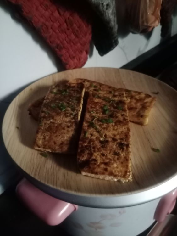 Step 1.1: Spread the curry powder mixture evenly over all sides of the tofu pieces