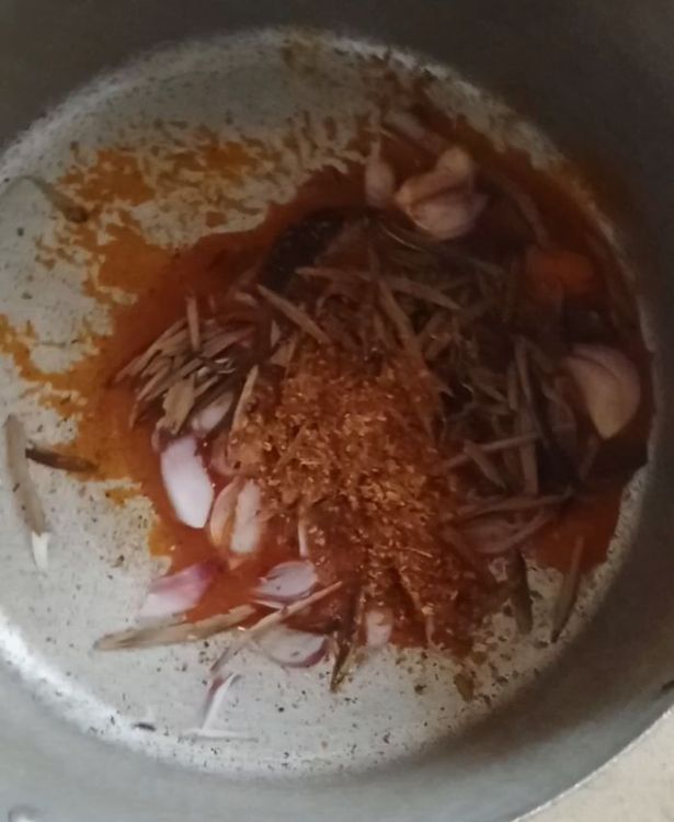 Step 2.1: Add the Ugba (oil bean seed) and stir into the palm oil mixture to give it a special native flavor