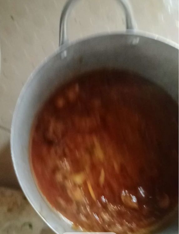 Step 7.1: After 5 minutes, bring the pot down from the fire