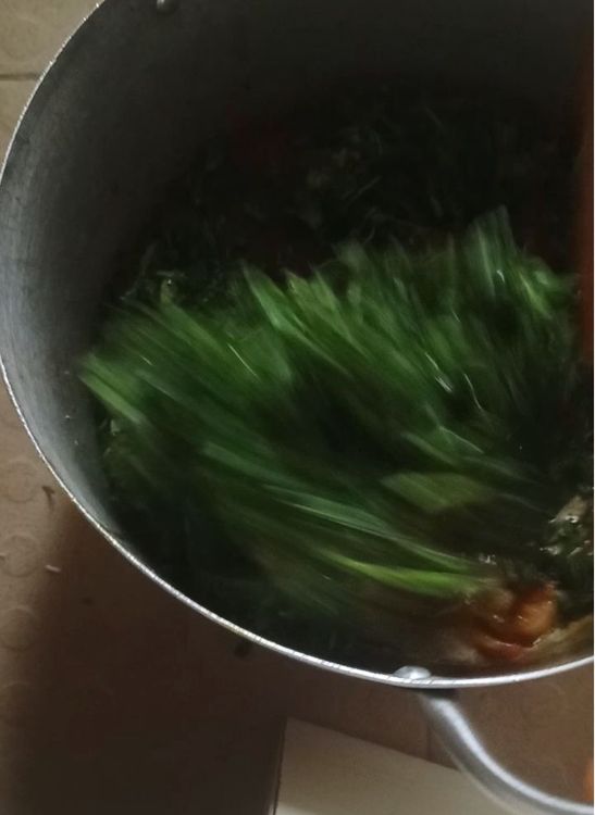 Step 9.1: Next, add the sliced garden egg leaves
