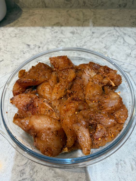 Step 2.1: Season chicken strips with paprika, piri piri seasoning, garlic powder, onion powder, black pepper, and salt