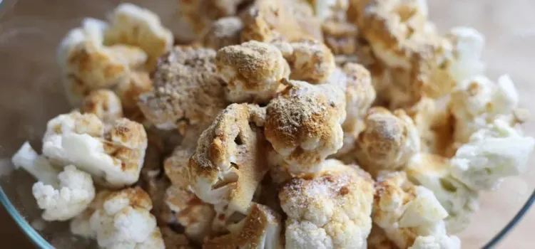 Step 1.1: In a medium bowl, combine the cauliflower florets, rice wine, ground ginger, salt, and ground white pepper