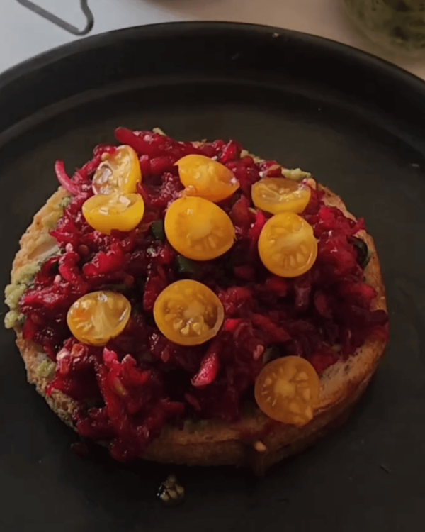 Step 3.1: Add a generous spoonful of the beet and apple relish on top of the pesto-covered toast