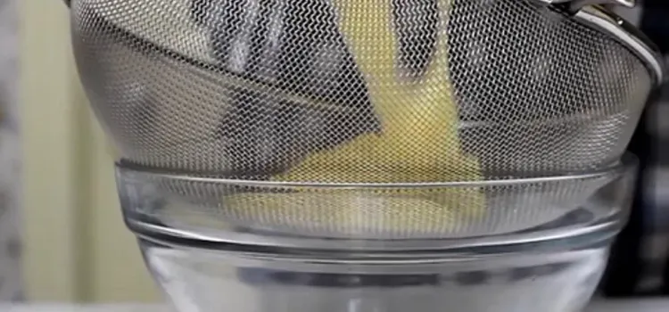 Step 2.1: Strain the thickened mixture into a bowl