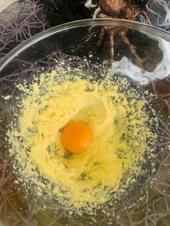 Step 1.1: Add the egg, vanilla, and almond extract to the mixture, and blend well
