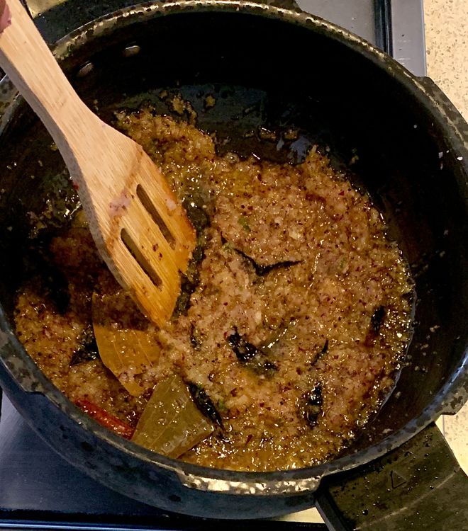 Step 1.1: Add the finely chopped onions to the pot and cook them until they turn golden brown
