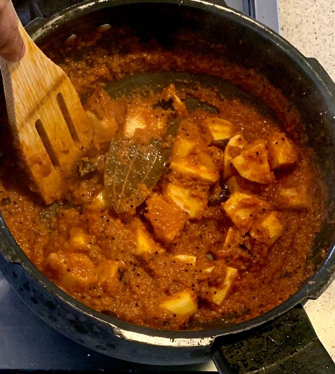 Step 1.2: Add the cubed potatoes to the curry and stir to coat them with the spice mixture