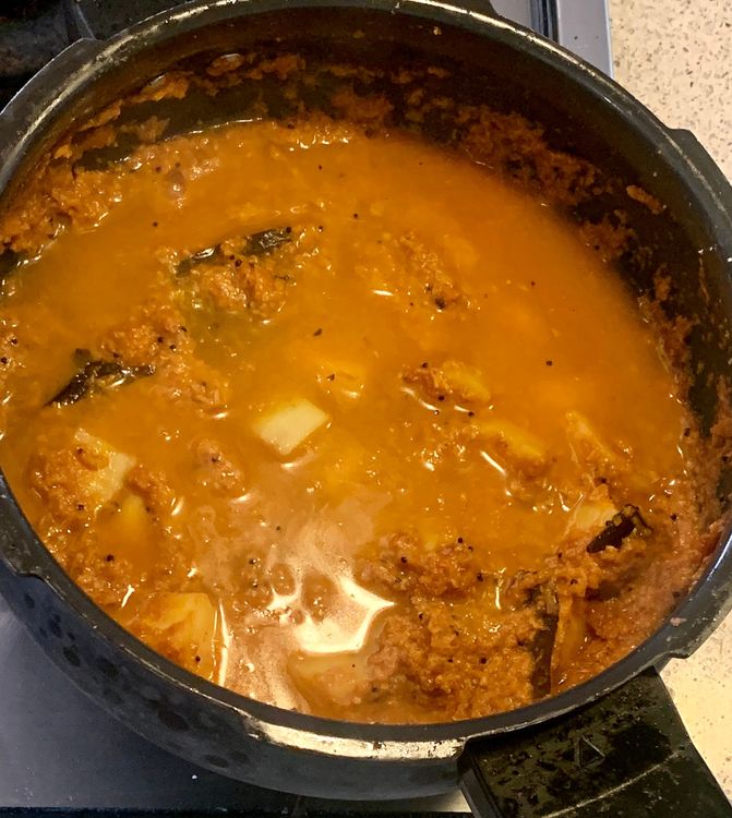 Step 1.1: Pour in the water to adjust the consistency of the curry